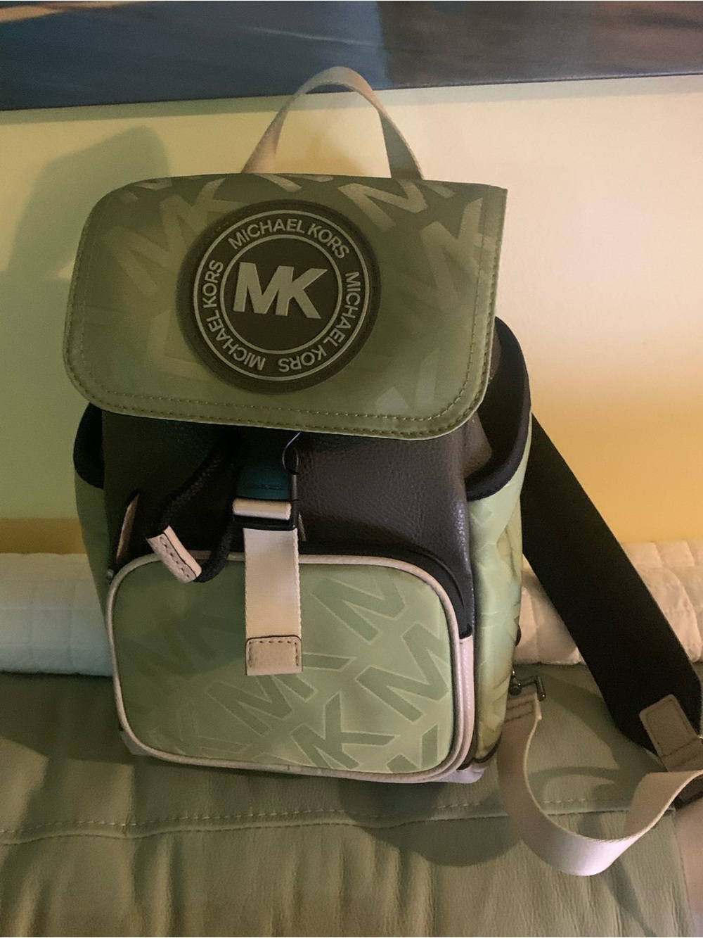 Michael Kors sling sage green signature unisex like new- great for Fall